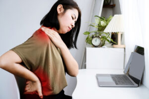 women in pain from sedentary lifestyle